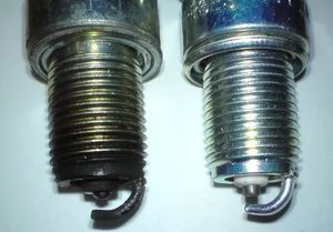Свечи зажигания - изношенная и новая