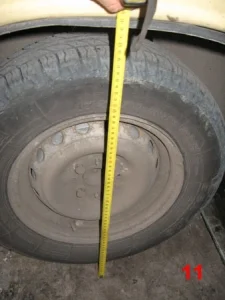 Замер рулеткой после установки новой пружины