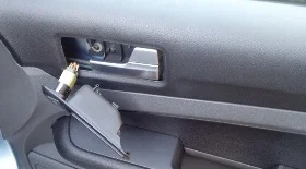 Removing the front door card on a Ford Focus Mk2