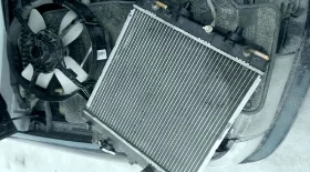 Замена радиатора Mazda Demio