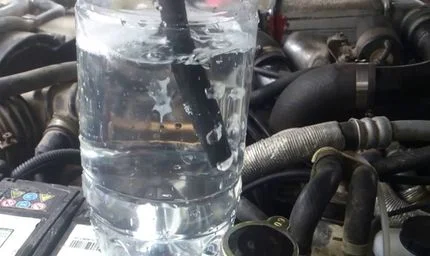 Checking the head gasket using a bottle