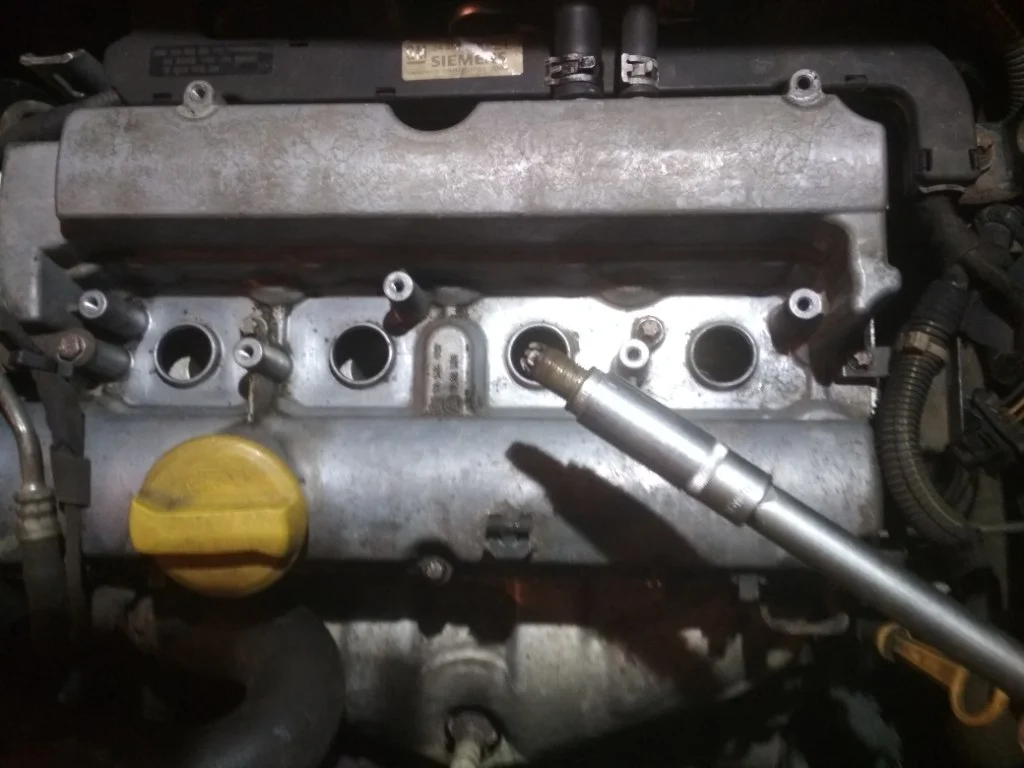 Замена свечей зажигания на Опель Астра 1,8