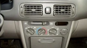 Замена ламп подсветки центральной консоли на Toyota Corolla E110