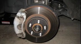 Замена передних тормозных колодок Тойота Королла