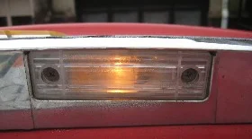 Замена лампы подсветки номера Авео