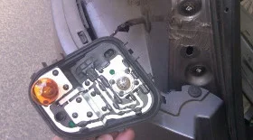 Замена ламп в задней фаре Рено Флюенс