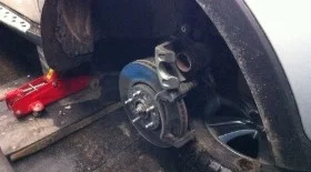 Замена передних тормозных колодок Киа Спортейдж 4