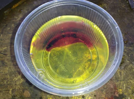 Марганцовка растворилась в бензине