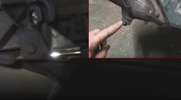 Нижний болт крепления фары