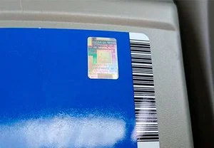 Голограмма на оригинальной канистре масла