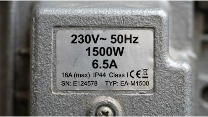 Electrical appliance nameplate showing power and current