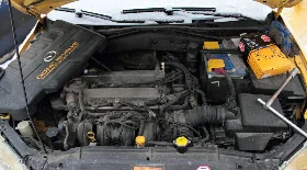 Замена свечей в двигателе Mazda 6