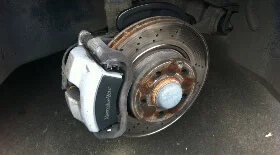 Замена тормозных дисков и колодок на Mercedes W203