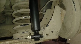 Замена заднего амортизатора на Opel Corsa C