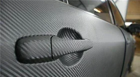 Поклейка автомобиля Ford Mondeo карбоновой пленкой 