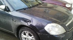 Ремонт вмятины крыла без покраски на NISSAN TEANA