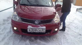Замена ламп головного света на Nissan Tiida