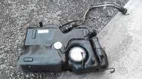 Снятие топливного бака и снятие топливного насоса Ford Fusion