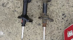 Замена стойки амортизатора Subaru Legacy