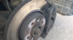 Замена передних тормозных колодок на Рено Сценик 1