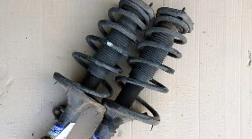 Замена заднего амортизатора Киа Спортейдж