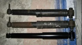 Замена заднего амортизатора Рено Меган 2