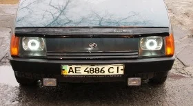 Замена лампочки ближнего/дальнего света на Таврии