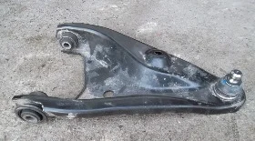 Замена рычага передней подвески Рено Логан