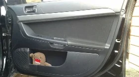 Снятие обшивки двери Лансер