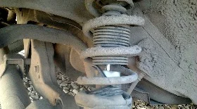 Замена задних амортизаторов Альмера N16