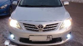 Замена лампы ближнего света Тойота Королла