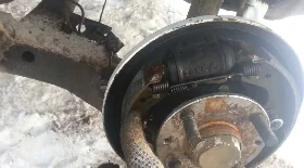 Замена задних колодок на Мазда Демио 