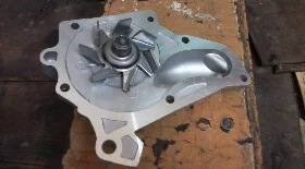 Замена помпы Митсубиси Шариот Грандис