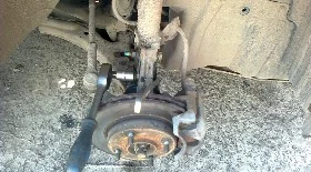 Замена передней стойки амортизатора Ниссан Альмера Классик