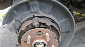 Замена колодок ручника Чери Тигго